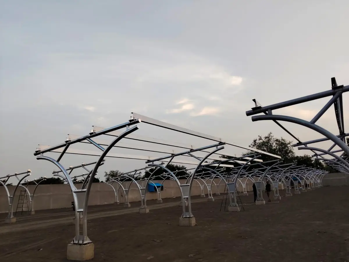Curved steel carport structure for Care Group under construction